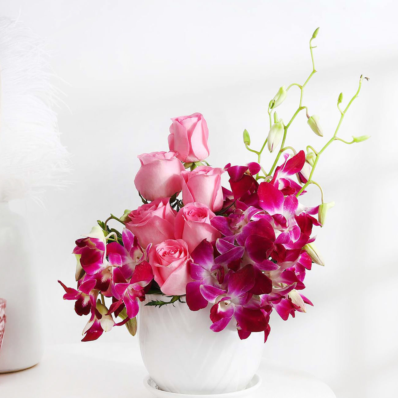 Roses and Orchid Bloom Arrangement