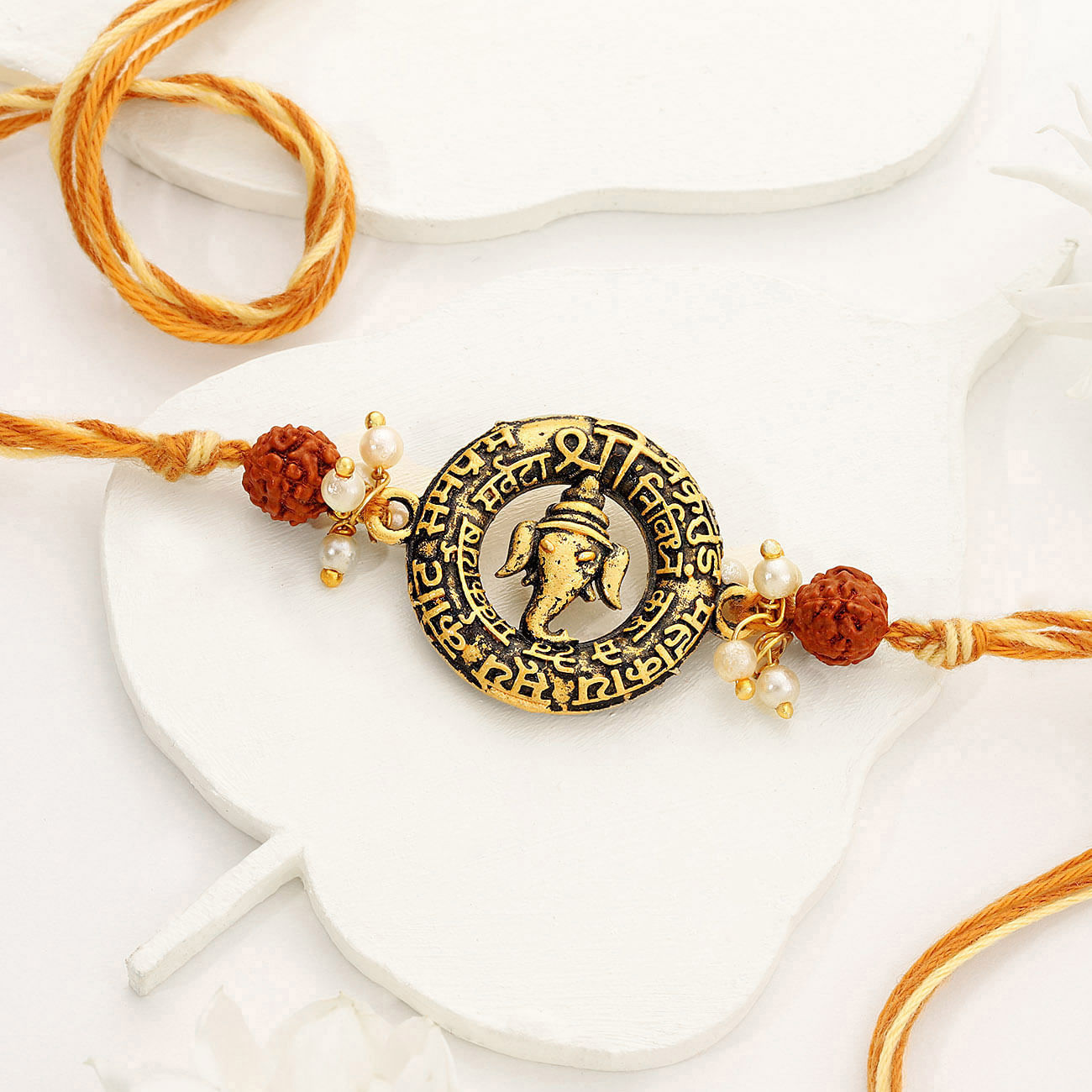 Rudraksh Beads And Ganesha Rakhi