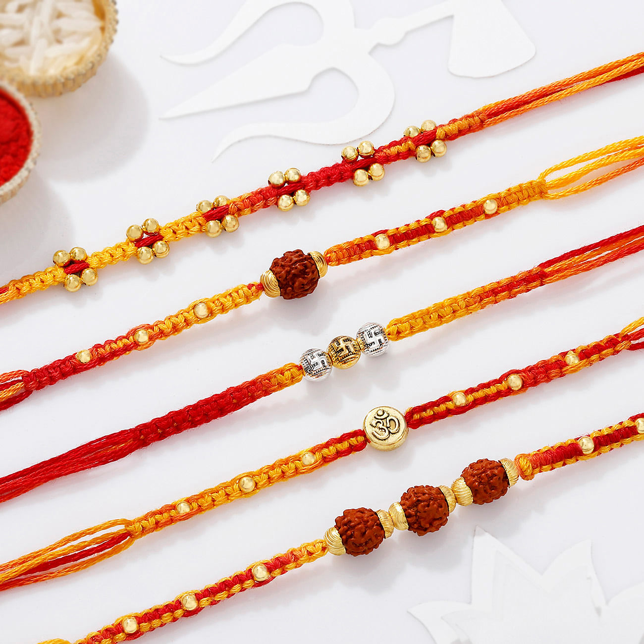 Sacred Knots Rudraksha And Om Rakhis - Set Of 5