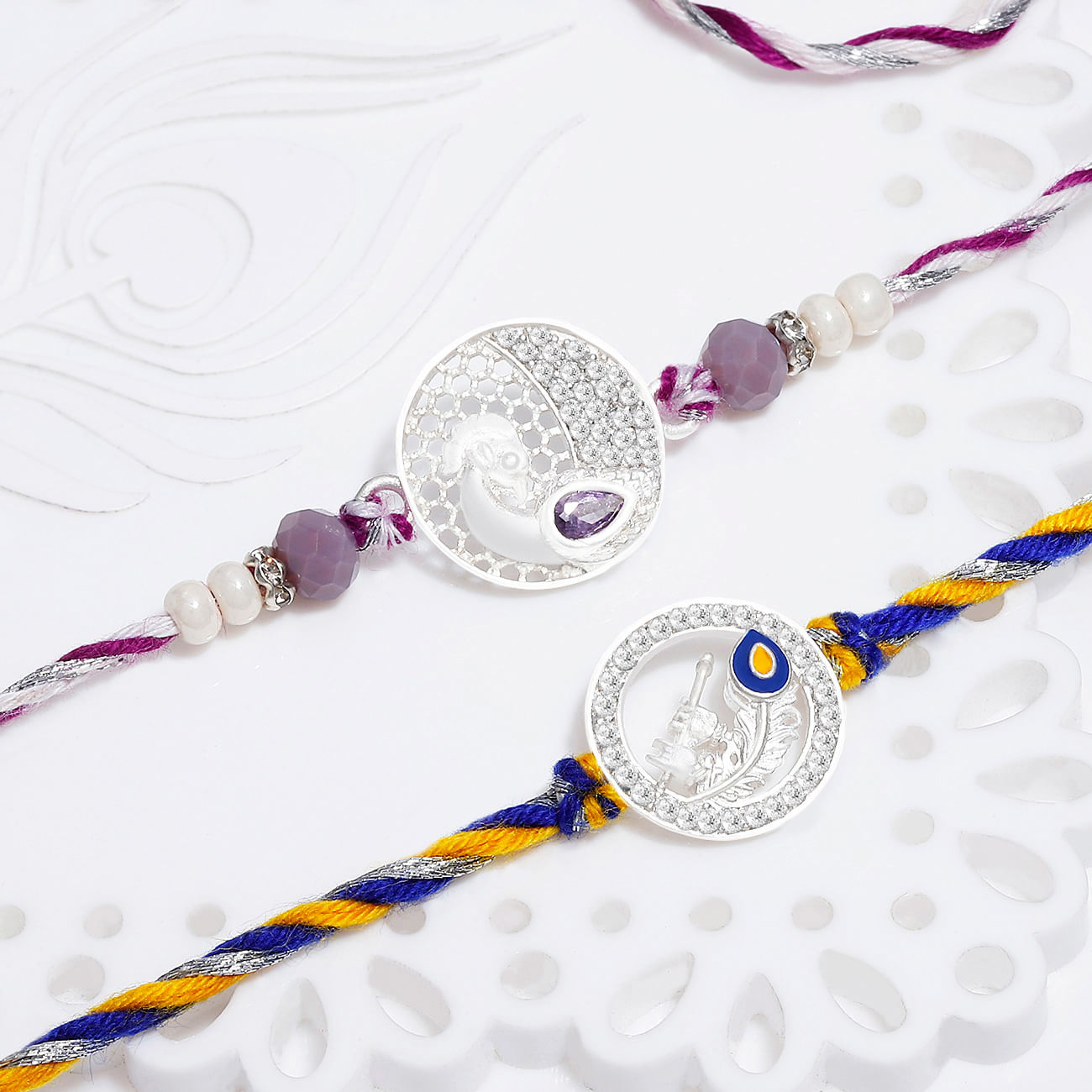 Silver-Plated Peacock And Krishna Rakhis - Set Of 2