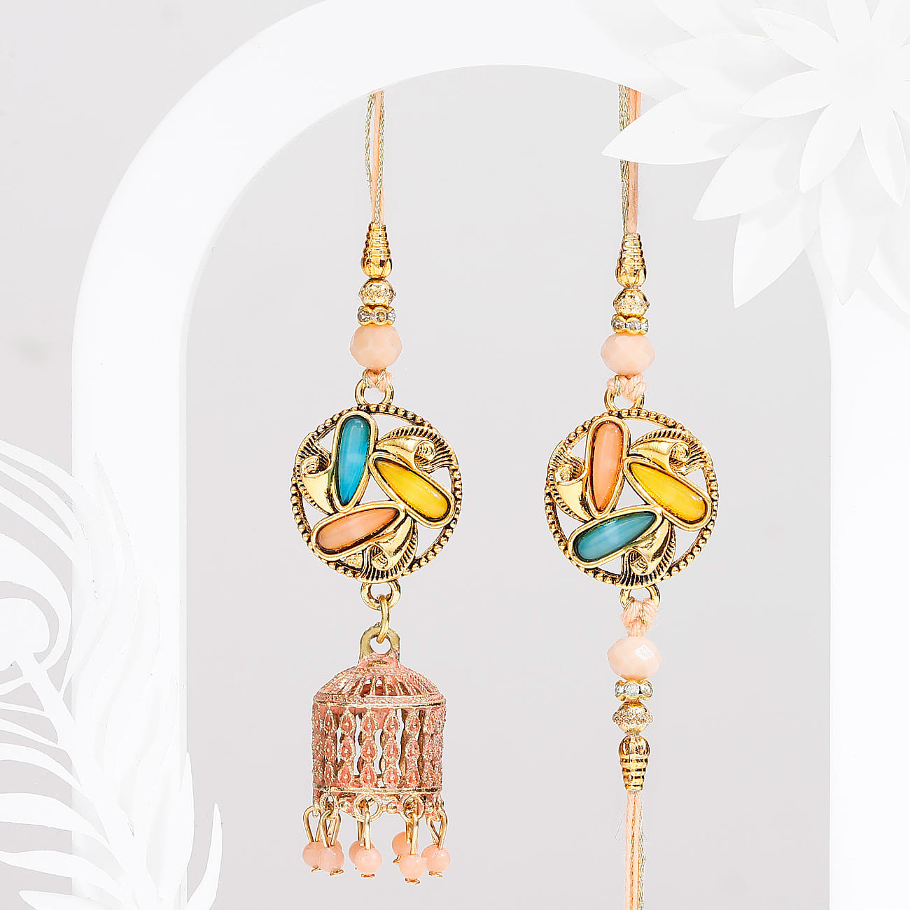 Temple Shaped Bhaiya Bhabhi Rakhi with Beads Work