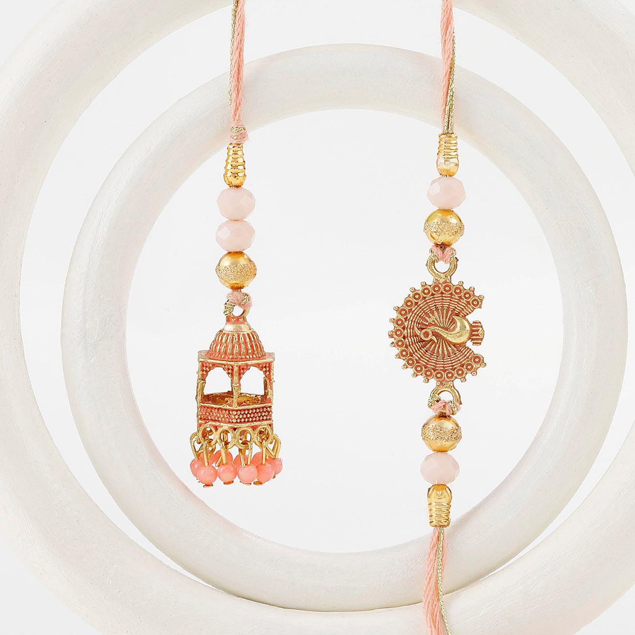 Temple Shaped Bhaiya Bhabhi Rakhi with Beads Work