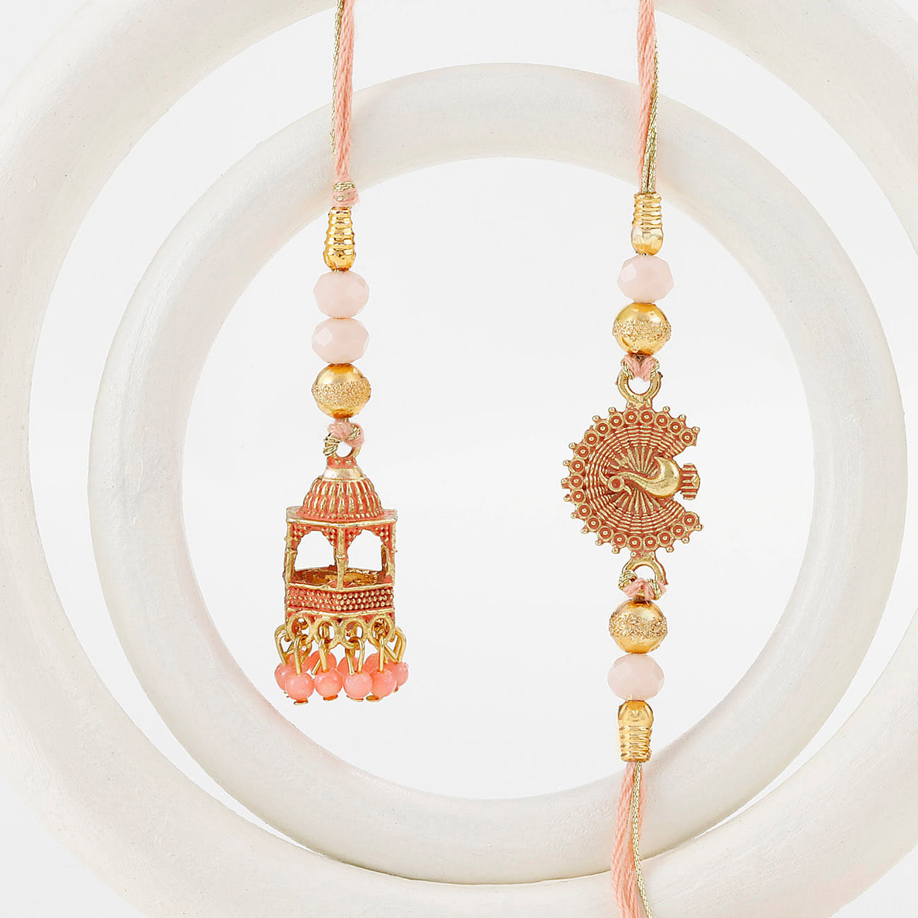 Temple Shaped Bhaiya Bhabhi Rakhi with Beads Work