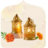 Collection of decorative clay and metal diyas